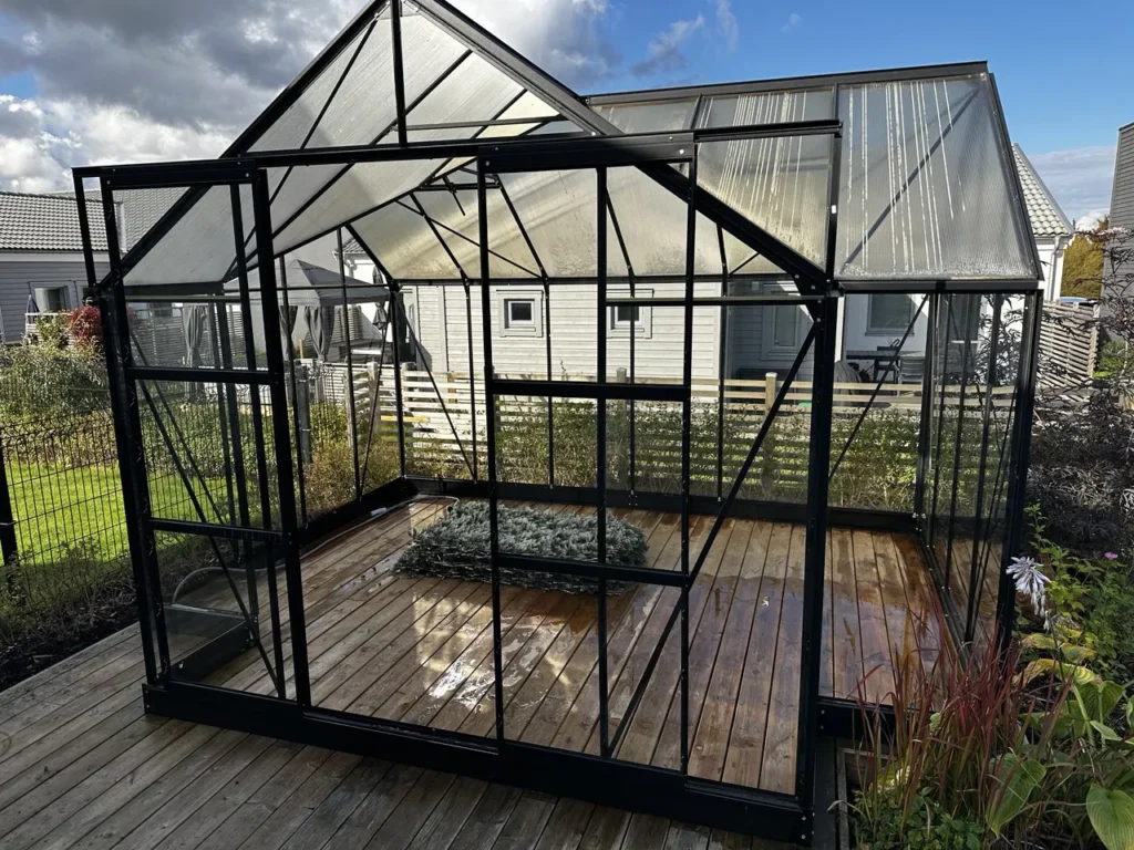 fönsterputs av växthus i Lomma 1